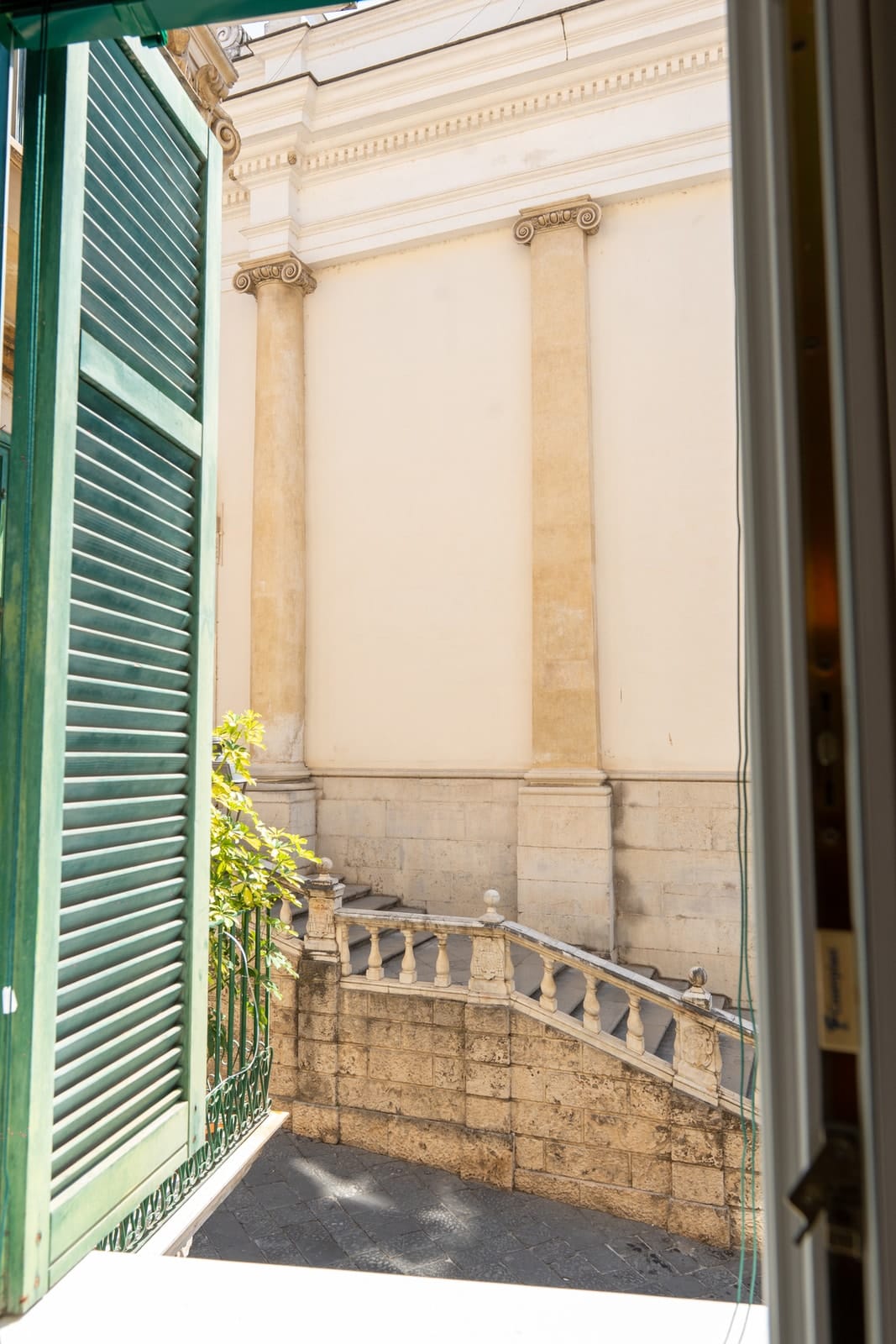 From the window in Hera, the cathedral atrium with its columns and balustrade